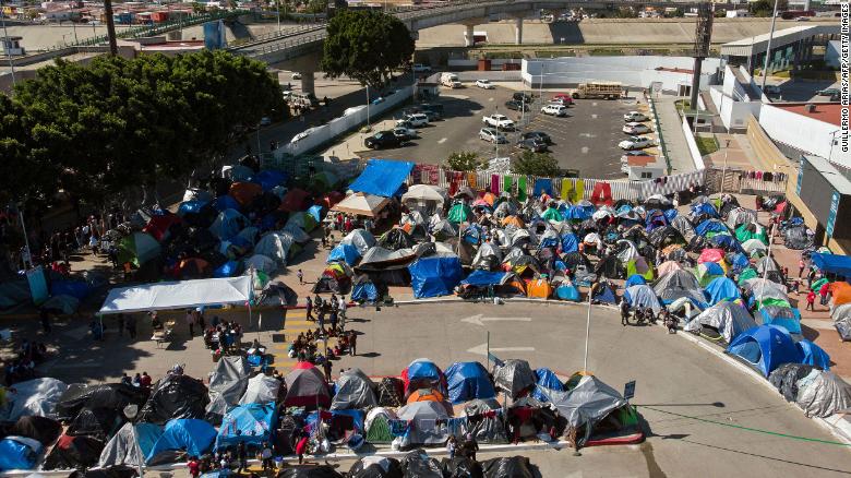 Aerial view of a migrants camp where asylum seekers wait for US authorities to allow them to start their migration process outside El Chaparral crossing port in Tijuana, Baja California state, Mexico, on March 17, 2021.