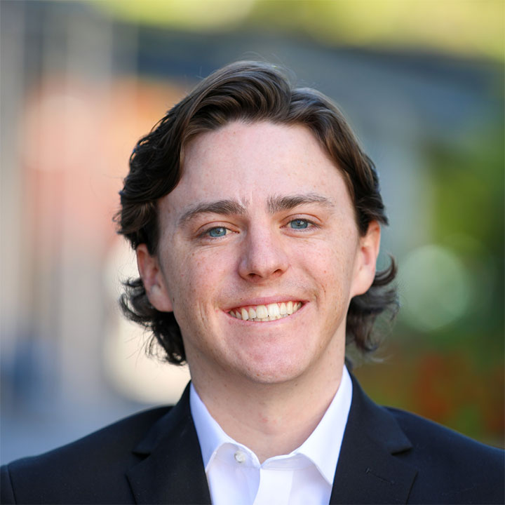Headshot of a person wearing professional attire