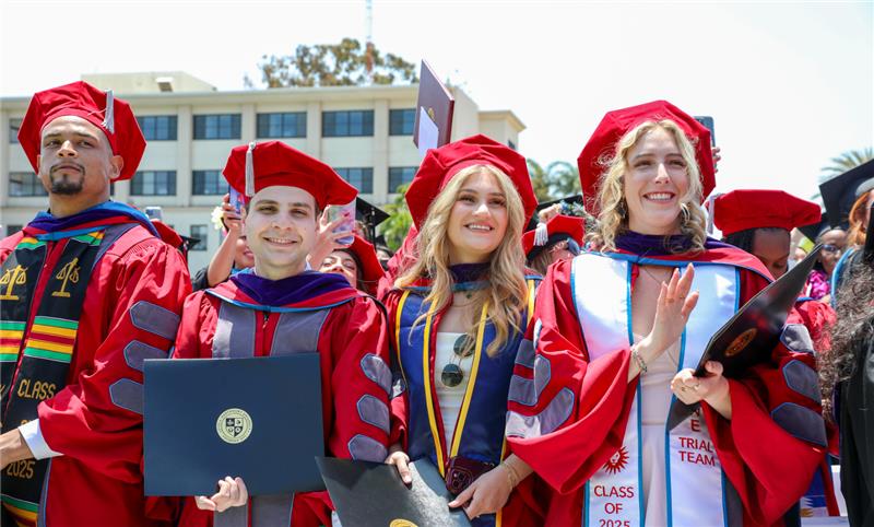 LLS graduates in red regalia